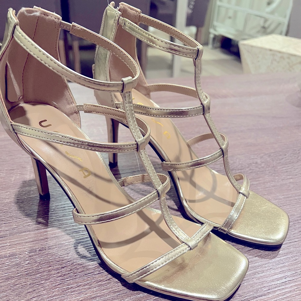 Worn once , unisa gold heels